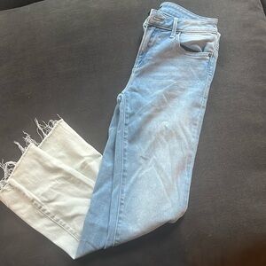 Aqua blue jeans with white wash on the bottom